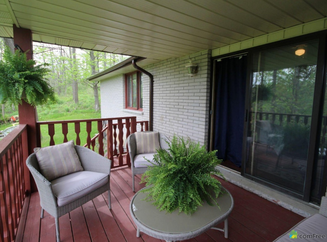 Shady deck off bedroom at 42815 Beck Line, St Thomas