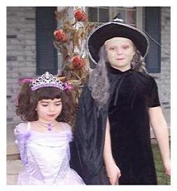 children at halloween a princess and a witch