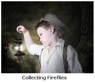 Little boy wearing a hat with fireflies in a jar