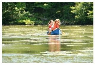 Family canoeing at Springwater Conservation Area