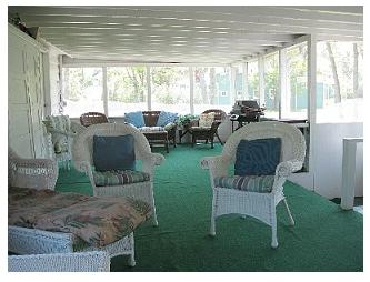 The screened-in porch at the cottage at Crystal Beach, Ontario