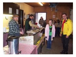 Maple Syrup Festival, Aylmer, child and father waiting for pancakes