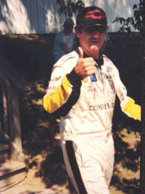 Canadian Race car Driver Ron Fellows giving a thumbs up
